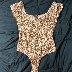 Rue21 cheetah bodysuit